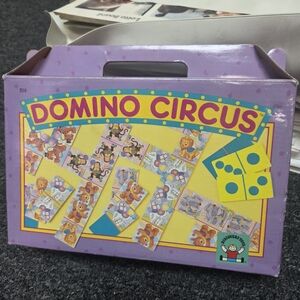 Discovery Domino Circus Board Game - Purple and Yellow